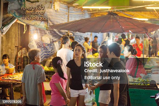 Thai people at local market in night