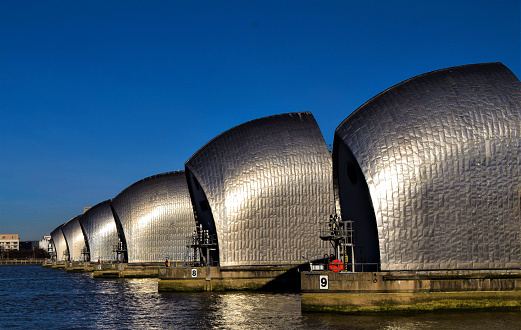 London, United Kingdom - February 3 2019: Daytime view of the Thames Barrier in Greenwich with a clear blue sky.