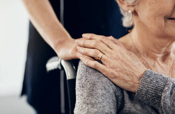 Thank you for being the support I need Cropped shot of a female caregiver comforting a senior woman healthcare worker stock pictures, royalty-free photos & images