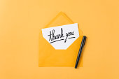 istock Thank You Message and Yellow Envelope 1407115390