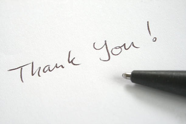 Thank You note written with ball pen stock photo