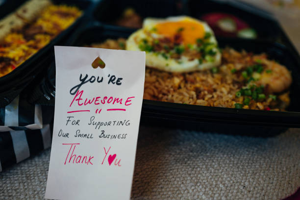 Thank-you-note comes with Bento take away order - Singapore stock photo