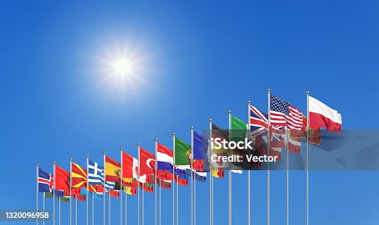 istock The 30 waving Flags of NATO Countries - North Atlantic Treaty. Isolated on sky background  - 3D illustration. 1320096958