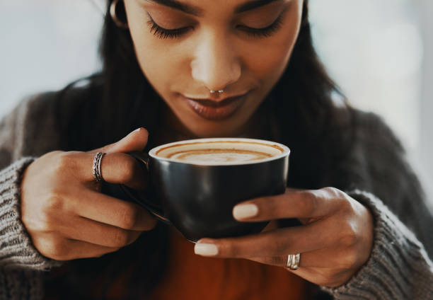 de allure van een goede kop koffie - africa cup stockfoto's en -beelden