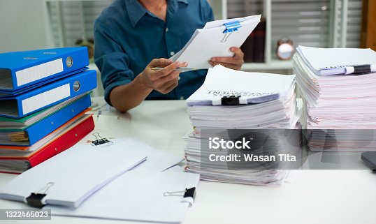 istock The auditors are busy working in the office. 1322465023
