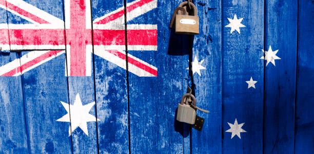 The Australian flag is in texture. Template. Coronavirus pandemic. Countries are closed. Locks. stock photo