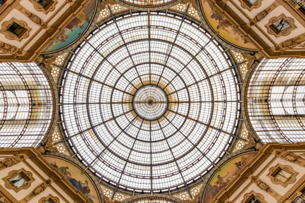 The awesome roof in the middle of the famous shopping centre Galleria Vittorio Emanuele in milan, italy The awesome roof in the middle of the famous shopping centre Galleria Vittorio Emanuele in milan, italy cupola stock pictures, royalty-free photos & images