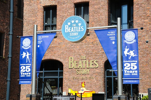 Liverpool, United Kingdom - June 11, 2015: Entrance to The Beatles Story building at Albert Dock, Liverpool, Merseyside, England, UK, Western Europe.