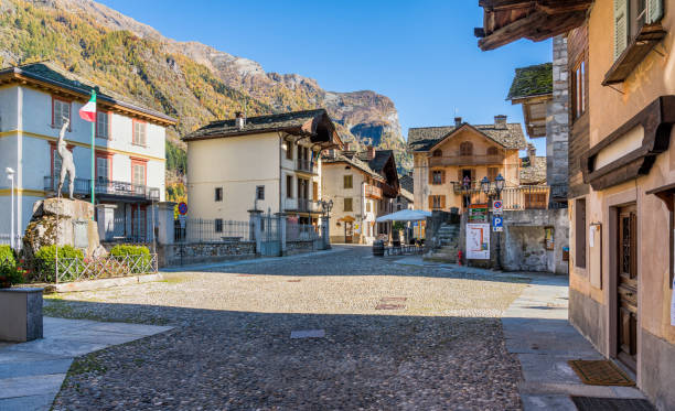 The beautiful village of Riva Valdobbia, during fall season, in Valsesia (Sesia Valley). Province of Vercelli, Piedmont, Italy. stock photo