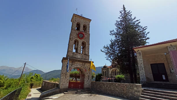 The bell tower in Mikro Chorio village at Karpenisi Greece stock photo
