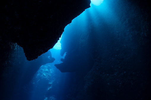 Image with the sunbeam and rock formation at the Blue Holes in Palau - Micronesia