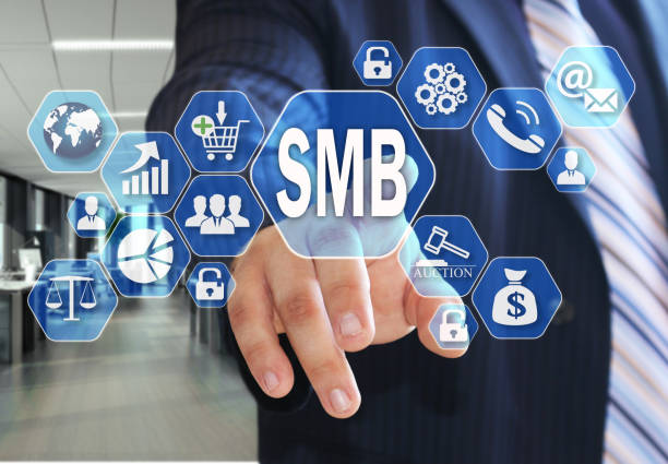 The businessman chooses the Small and medium business, SMB on the virtual screen in the business network connection. stock photo
