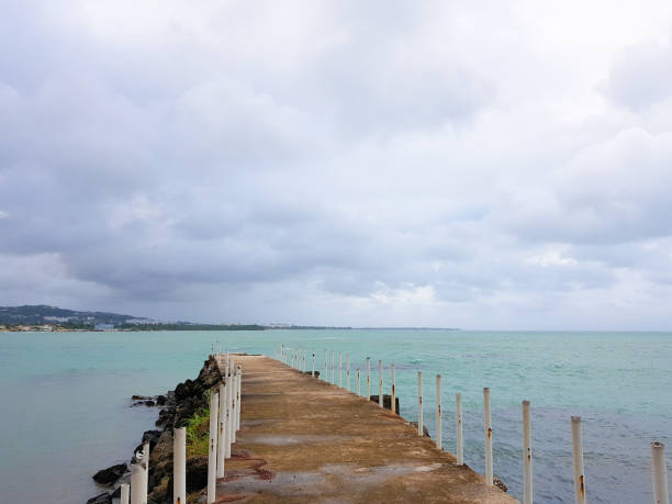 The Caribbean be under a very cloudy sky: The calm before the storm. Luquillo, Puerto Rico, USA stock photo
