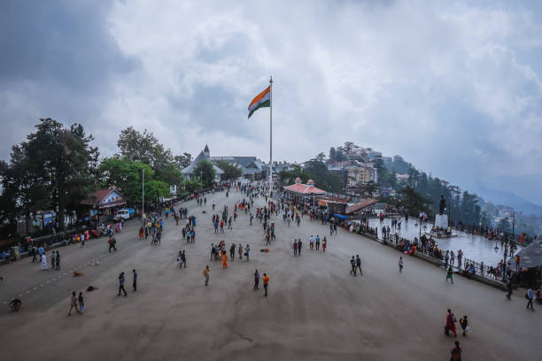 The central square of Shimla and walking people, visitors and tourists Shimla, India - July 5, 2017: The central square of Shimla and walking people, visitors and tourists shimla stock pictures, royalty-free photos & images