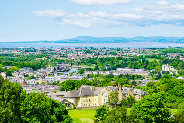 The cityscape of Lancaster, with Morecambe Bay viewed from the Ashton Memorial in Williamson Park. The cityscape of Lancaster, with Morecambe Bay viewed from the Ashton Memorial lancaster lancashire stock pictures, royalty-free photos & images