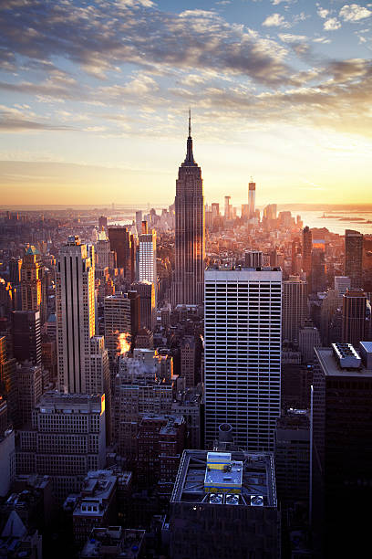 The crowded city of New York City as the sun sets stock photo