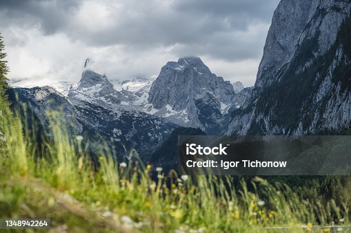 istock The Dachstein summit mountain range and visible glacier ice during summertime at Gosau, Upper-Austria, Europe 1348942264
