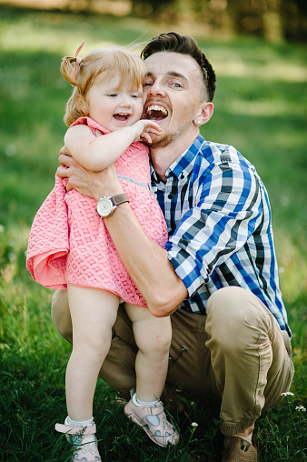 Father Carrying Daughter In Summer Vacation Stock Photo 