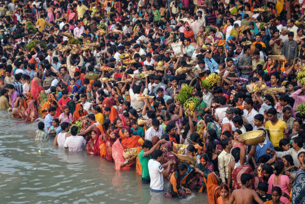 The devotees are celebrating Chhath festival in the bank of river Ganga in Howrah. Howrah west Bengal 11.13.2010 The devotees are celebrating Chhath festival in the bank of river Ganga. chhath stock pictures, royalty-free photos & images