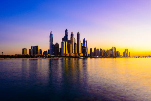 The Dubai Marina Skyscrapers Glowing at Sunset, United Arab Emirates stock photo