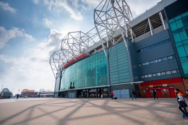 The east stand of Old Trafford football stadium, Old Trafford is the largest stadium home of Manchester united football club. The east stand of Old Trafford football stadium, Old Trafford is the largest stadium home of Manchester united football club. Manchester united stock pictures, royalty-free photos & images