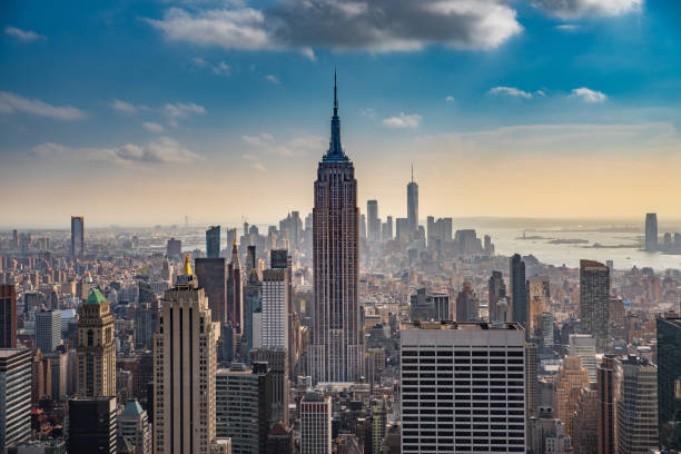 The Empire State Empire State Building as seen from Rooftop of Rockefeller Building urban skyline photos stock pictures, royalty-free photos & images