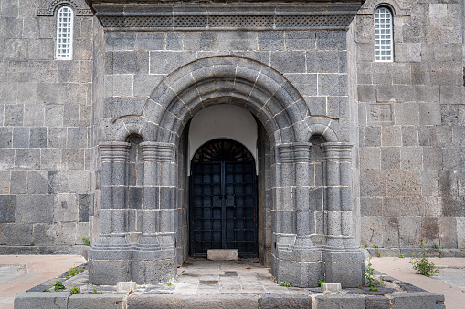 The entrance of old historical curch Holy Apostles Church in east of Turkey, Kars. Travel destination concept. High quality photo