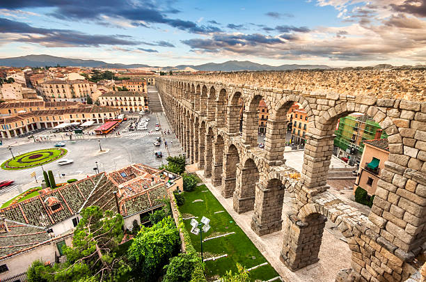 The famous ancient aqueduct in Segovia, Castilla y Leon, Spain The famous ancient aqueduct in Segovia, Castilla y Leon, Spain castilla y león stock pictures, royalty-free photos & images
