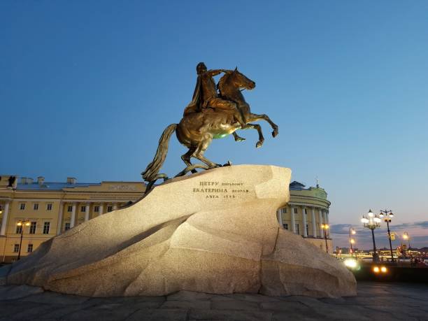 The famous "Bronze Horseman" illuminated at night stock photo