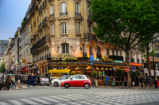 Paris, France - circa May, 2017: The famous restaurant Le Dome on Montparnasse boulevard in Paris. Opened in 1898 it was frequented by famous sculptors, writers and painters