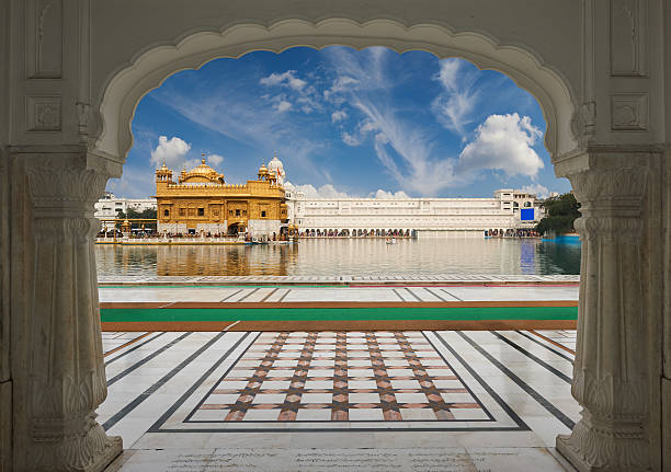 The Golden Temple, located in Amritsar, Punjab, India. Famous indian landmark - Sikh gurdwara Golden Temple (Harmandir Sahib). Amritsar, Punjab, India pilgrims monument stock pictures, royalty-free photos & images