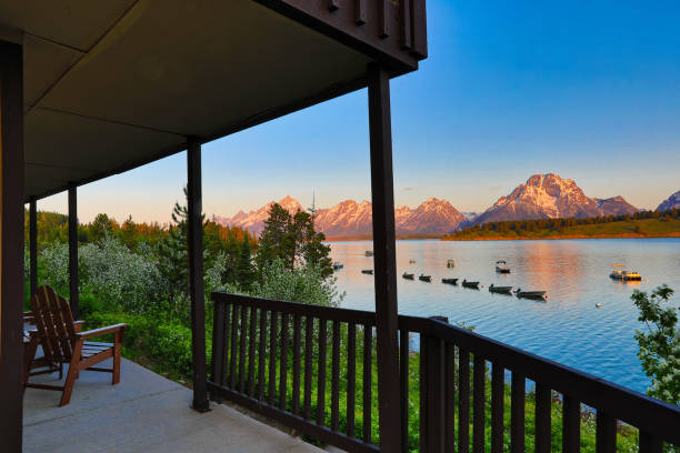 The Grand Tetons  with Jackson Lake in the foreground stock photo