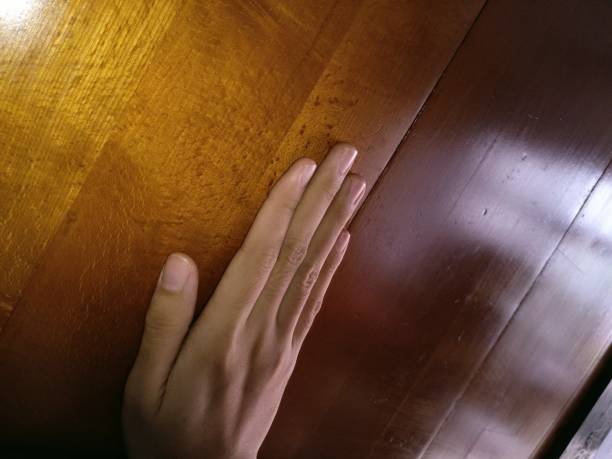the hand hitting the door stock photo