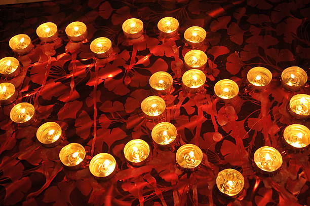 The heart of the burning candles stock photo