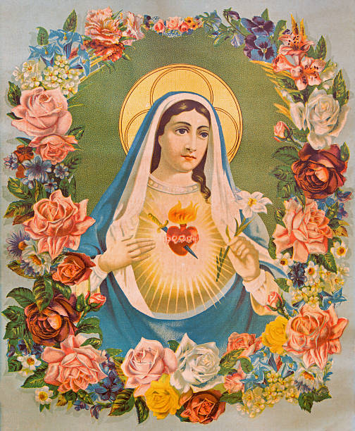 The Heart of Virgin Mary in the flowers. The Heart of Virgin Mary in the flowers. Typical traditional catholic image printed in Germany in end of 19. cent. originally designed by unknown painter and taken in village Sebechleby in Slovakia. virgin mary stock pictures, royalty-free photos & images