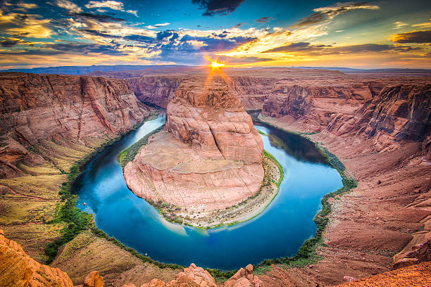 The Horseshoe Bend Canyon, Arizona scenics Sunset at The Horseshoe Bend, Page - Arizona. Amazing Grand Canyon of the Colorado River. Sunburst. coconino county stock pictures, royalty-free photos & images