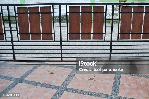 istock The house fence with a modern minimalist design 1365911444