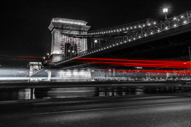 The Hungarian Chain-Bridge with the lights of the cars stock photo