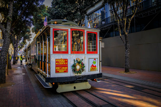 The iconic cable car decorated with a wreath for Christmas in San Francisco, USA stock photo