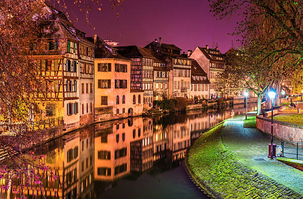 The Ill river in Petite France area, Strasbourg The Ill river in Petite France area, Strasbourg petite france strasbourg stock pictures, royalty-free photos & images