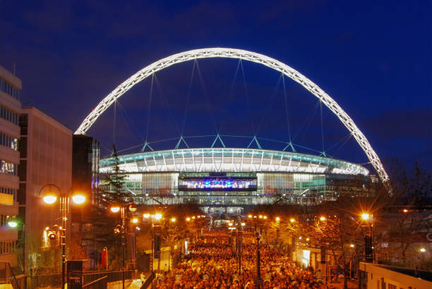 The illuminated arch of Wembley Stadium in London, UK stock photo