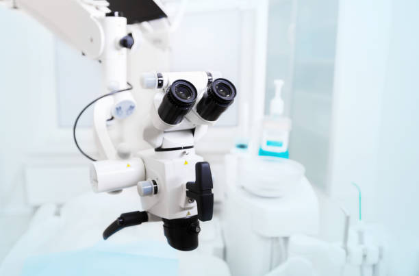 The image of the professional Dental endodontic binocular microscope stock photo
