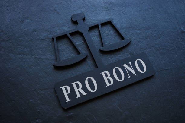 The inscription Pro bono on the plate in the form of scales. stock photo