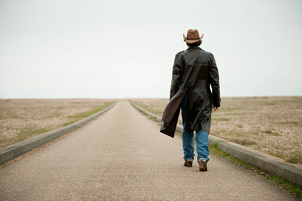 113 Cowboy Walking Away Stock Photos, Pictures & Royalty-Free Images -  iStock