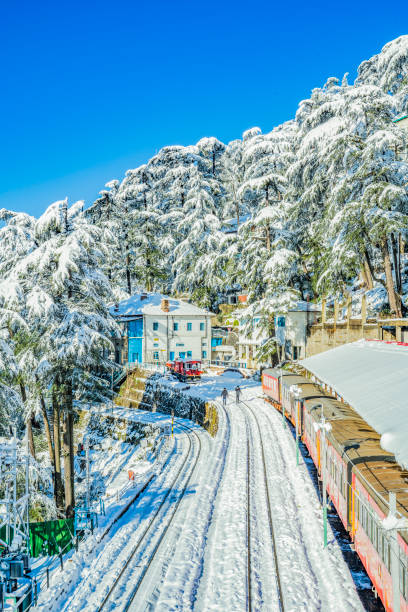 The Kalka to Shimla railway is a 2 ft 6 in (762 mm) narrow-gauge railway in North India which traverses a mostly-mountainous route from Kalka to Shimla. The Kalka to Shimla railway is a 2 ft 6 in (762 mm) narrow-gauge railway in North India which traverses a mostly-mountainous route from Kalka to Shimla. shimla stock pictures, royalty-free photos & images