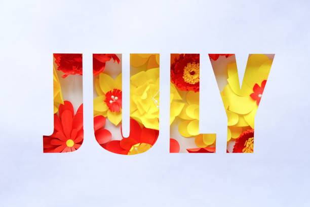 las letras de julio, hechas de flores de papel. hola, julio. concepto de floración, verano - july fotografías e imágenes de stock