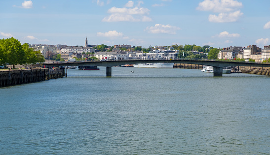 Nantes, France - May 12, 2019: View of Nantes cityscape across Loire River