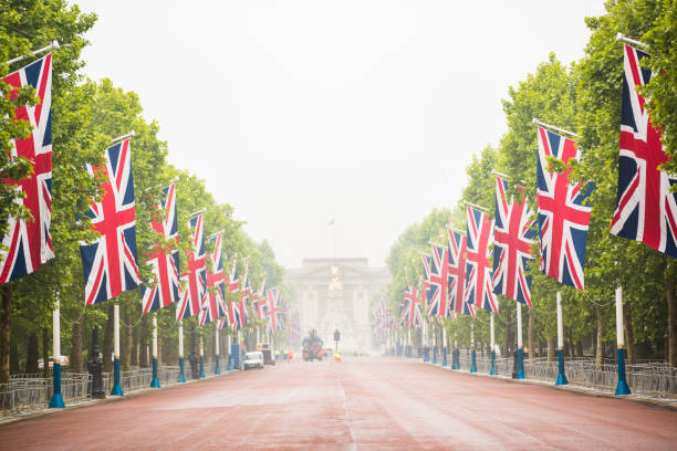 The Mall decorated with Union Jack flags London UK stock photo