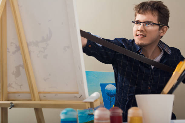 The man draws a picture. stock photo