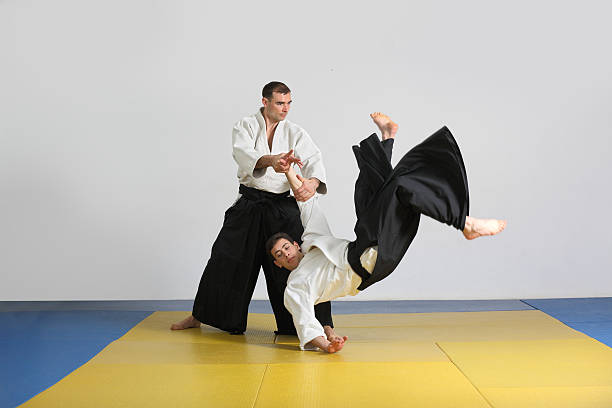 The martial art of Aikido. two men demonstrate the techniques of Aikido. stock photo